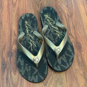 Michael Kors gold flip-flops MK